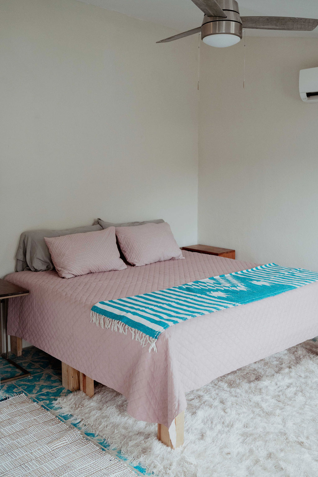 Large casita — king bed with rose duvet and teal tile floor